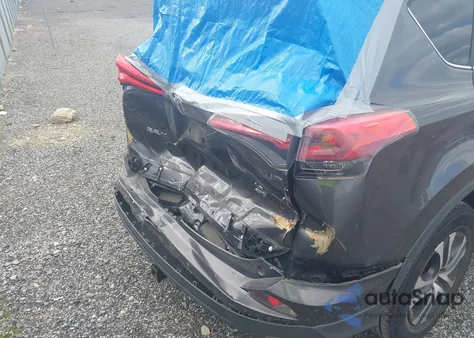 2018 Toyota Rav4 Le z USA, uszkodzony, nr VIN JTMBFREV9JJ734373